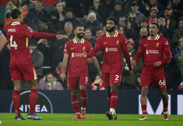 Liverpool players celebrate Mohamed Salah's goal against Leicester