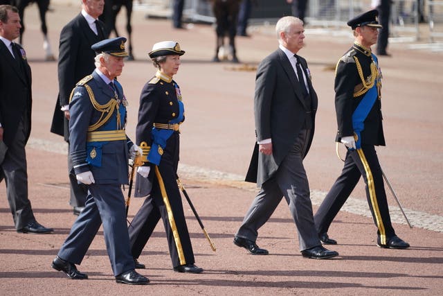 The Queen's children join the procession