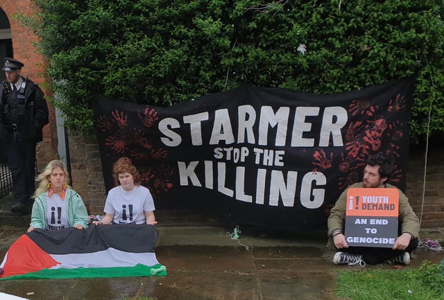 Lewis, left to right, Ward and Formentin protesting outside the London home of Labour leader Sir Keir Starmer 