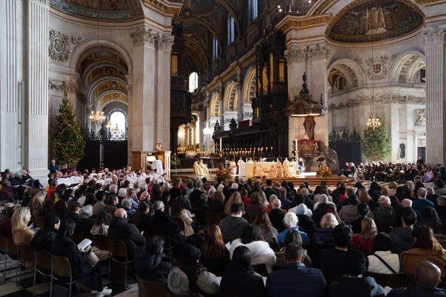 People at the Christmas Day Eucharist service at St Paul’s Cathedral