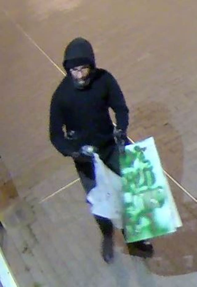 CCTV image of a hooded man