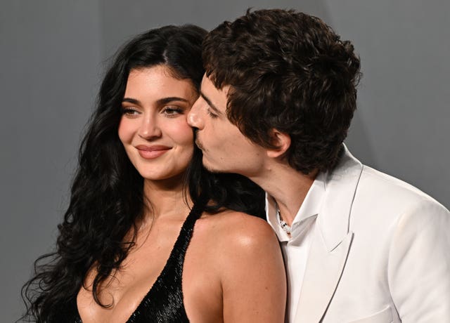 Kylie Jenner being kissed by Timothee Chalamet