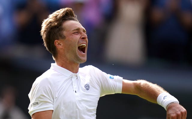 Liam Broady celebrates victory over Casper Ruud at Wimbledon 