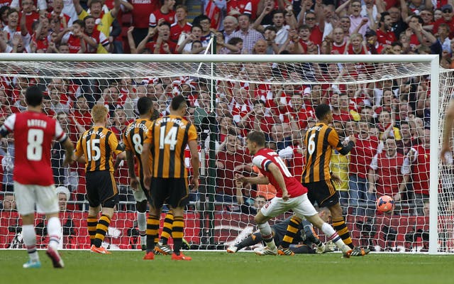 Aaron Ramsey, centre right, scores Arsenal's 2014 FA Cup winner against Hull