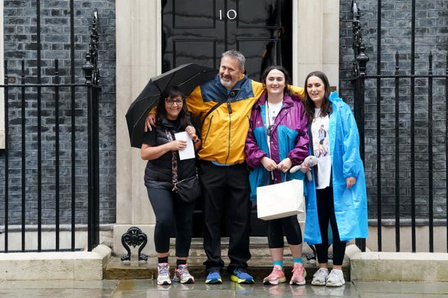 Figen Murray at Number 10 Downing Street with (left-right) her husband Stuart and daughters Nikita Murray and Louise Webster