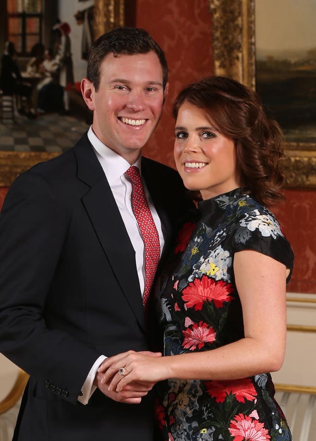 Princess Eugenie and Jack Brooksbank in the Picture Gallery at Buckingham Palace in London after they announced their engagement (Jonathan Brady/PA)