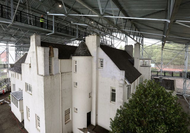 Hill House beneath a steel roof