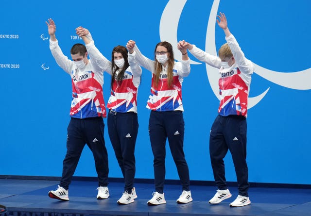 Great Britain's Reece Dunn (left), Bethany Firth, Jessica-Jane Applegate and Jordan Catchpole celebrate after winning gold during the mixed 4x100m freestyle - S14