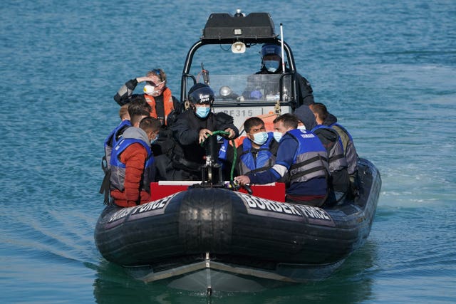 A group of people thought to be migrants are brought into Dover, Kent, following a small boat incident in the Channel