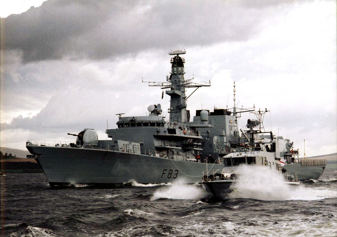 Royal Navy frigate shadows Russian warship in English