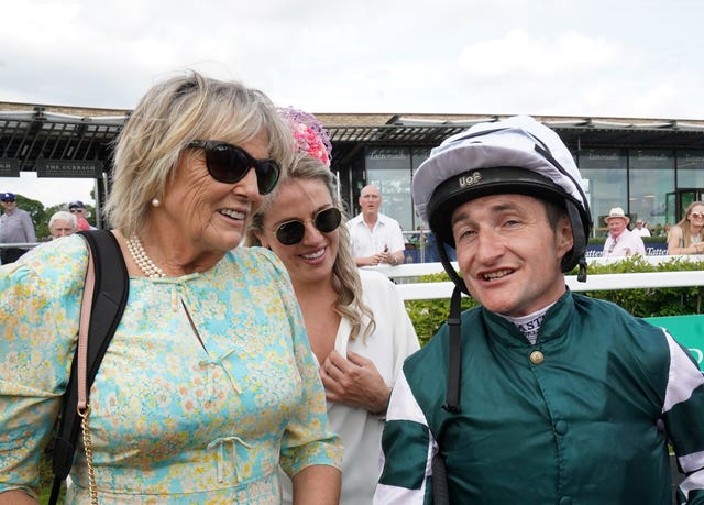 Jessica and Kate Harrington with jockey Shane Foley