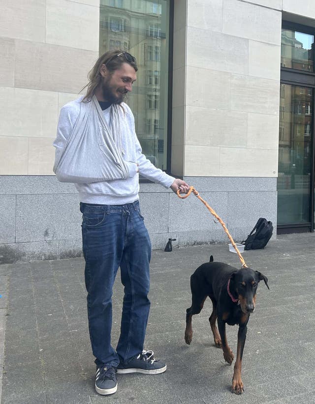 Alex Jenkinson outside Westminster Magistrates’ Court with his dog Indie