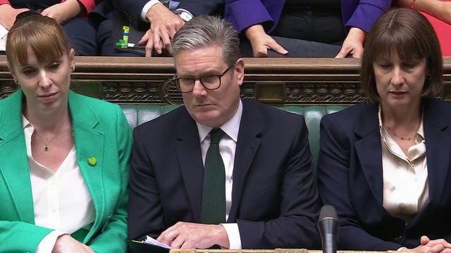 Angela Rayner, left, Sir Keir Starmer, centre, and Rachel Reeves on the Government front bench in the House of Commons