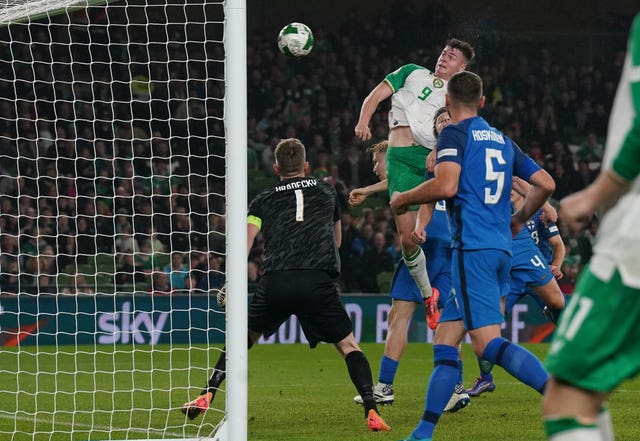 Evan Ferguson (centre right) heads home the winner 