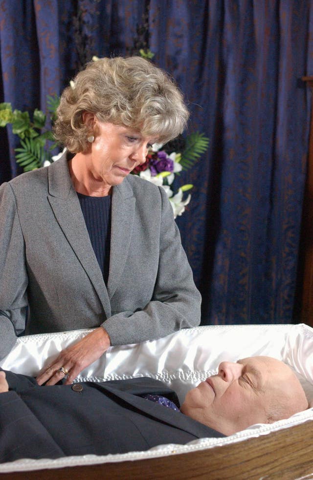 Audrey Roberts, played by Sue Nicholls, says goodbye to Fred, played by John Savident, before his funeral