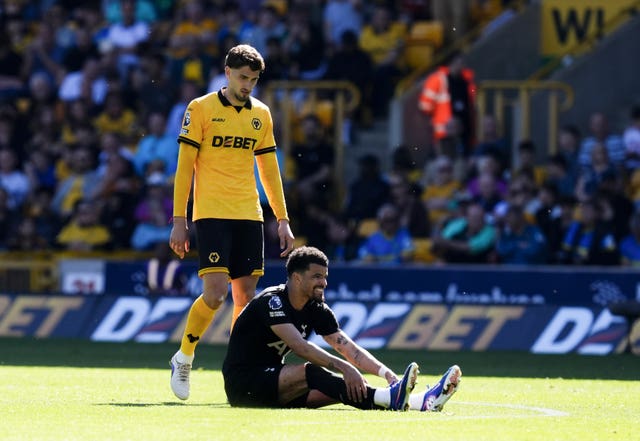 Dominic Solanke sits injured 