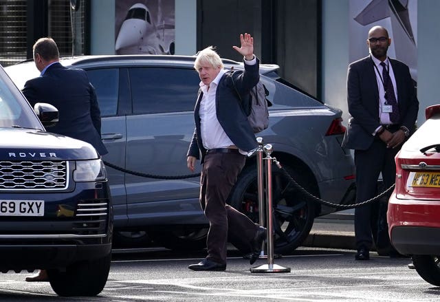 Former Prime Minister Boris Johnson arrives at Gatwick Airport in London on Saturday 