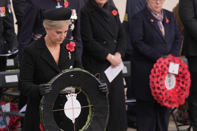 The Duchess of Edinburgh lays a wreath during an Armistice Day service at the National Memorial Arboretum