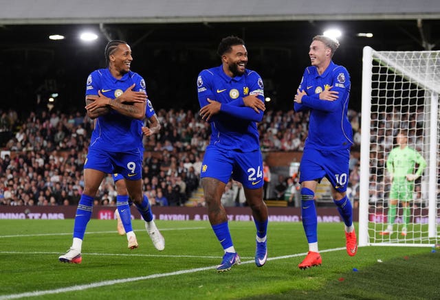 Chelsea’s Cole Palmer celebrates scoring their side’s third goal of the game with Joao Pedro and Reece James