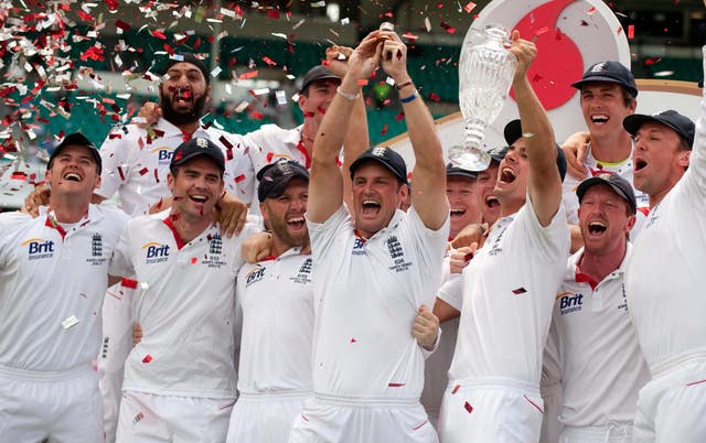 Strauss and England players celebrate
