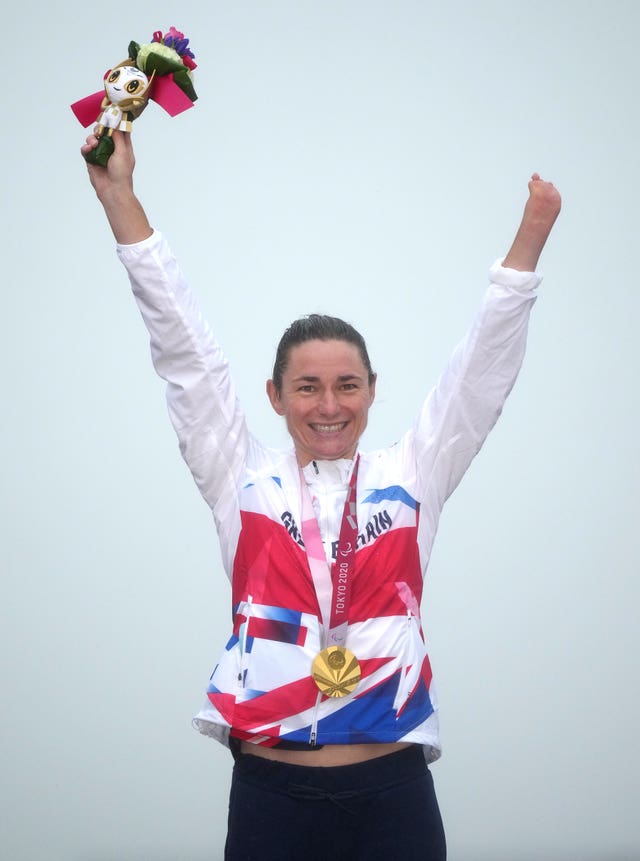 Dame Sarah Storey celebrates winning the gold medal in the Women’s C4-5 Road Race at the Fuji International Speedway during day nine of the Tokyo 2020 Paralympic Games in Japan