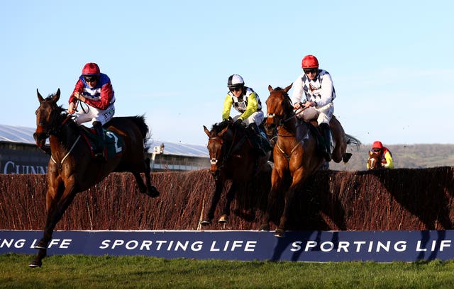 Escaria Ten (left), jumps the last in the Sam Vestey National Hunt Challenge Cup Novices’ Chase (Grade 2) during day one of the Cheltenham Festival in 2021 