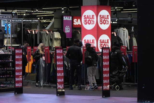 Shoppers in a branch of JD Sports in Liverpool during the Boxing Day sales