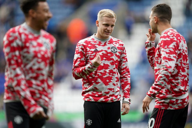 Donny van de Beek (centre) continues to be a peripheral figure at Old Trafford