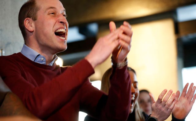 The Duke of Cambridge reacts as his team wins a table football match at an event promoting his Heads Up initiative which uses football to encourage men to speak about their issues