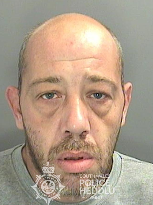 John Cole, 40, will spend at least 29 years in prison for murdering his stepson (South Wales Police/PA)