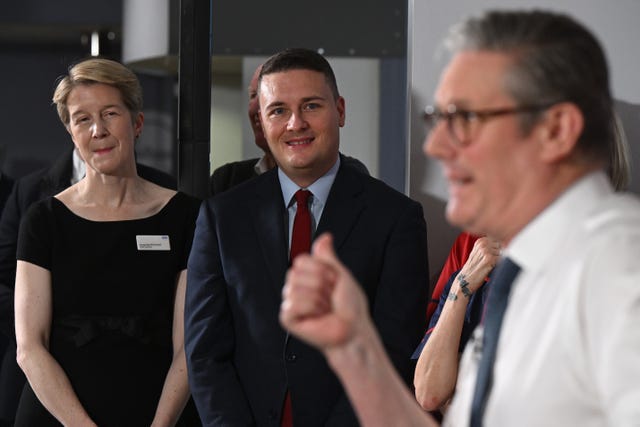 NHS chief executive Amanda Pritchard and Health Secretary Wes Streeting look on as Prime Minister Sir Keir Starmer delivers a speech during a visit to the Elective Orthopaedic Centre in Epsom, Surrey