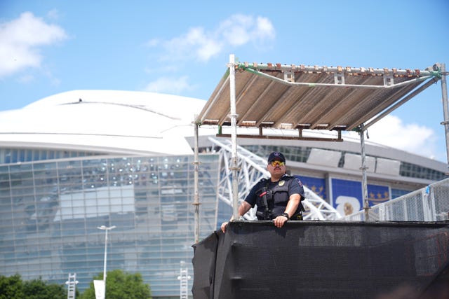 A police officer in a lookout tower