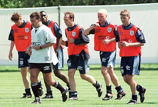 Bryan Robson, pictured in the white shirt, also had a spell on the England coaching staff 