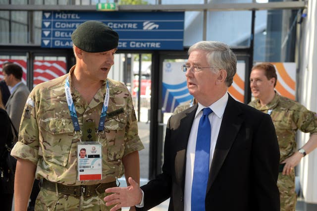 Marcus Reedman with then defence secretary Michael Fallon in 2014