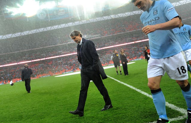 Mancini was sacked shortly after City lost the 2013 FA Cup final to Wigan (Anthony Devlin/PA).