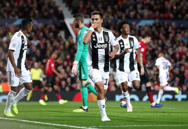 Paulo Dybala celebrates scoring against Manchester United