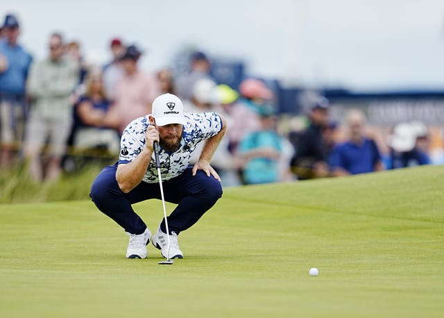 Tyrrell Hatton lines up a putt