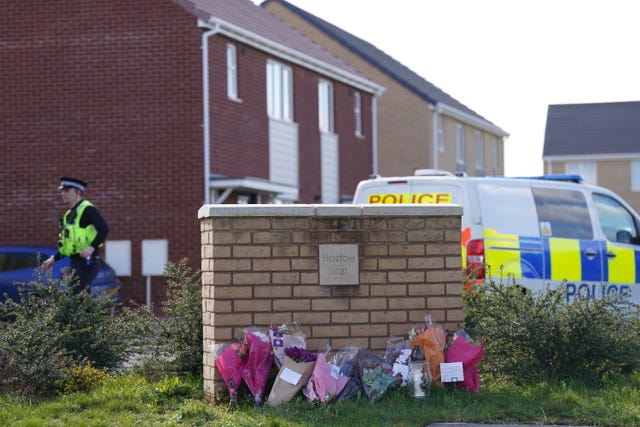 Flowers left at the scene in Bluntisham, Cambridgeshire