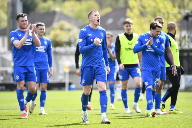 John Lundstram, centre, leads the celebrations after Rangers’ win