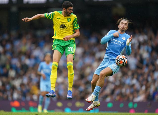 Jack Grealish, right, enjoyed an impressive home debut for Manchester City 