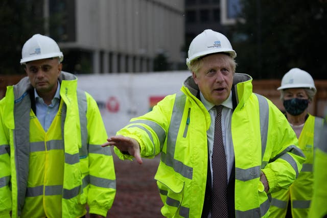 Boris Johnson and Health Secretary Sajid Javid (left) visit the construction site of the new children's hospital at Leeds General Infirmary