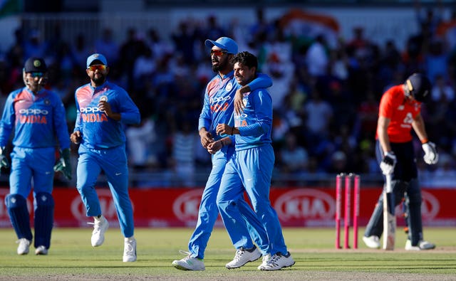 Kuldeep Yadav, right, put England in a spin at Old Trafford 