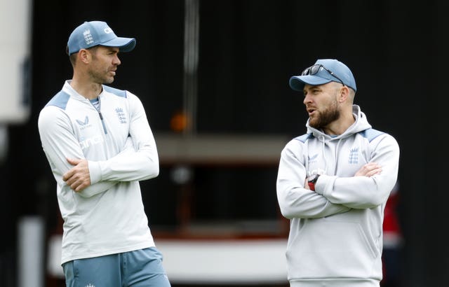 James Anderson, left, was informed England are looking to the future in a face-to-face conversation with Brendon McCullum (Steven Paston/PA)