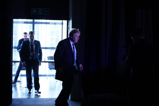 Prime Minister Boris Johnson arrives to deliver his speech