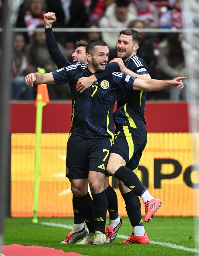 Scotland’s John McGinn celebrates scoring their first goal against Poland