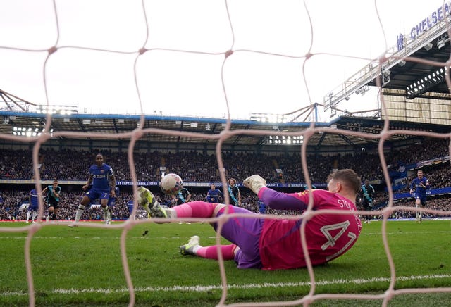 Leicester goalkeeper Jakub Stolarczyk saves a penalty from Chelsea’s Raheem Sterling