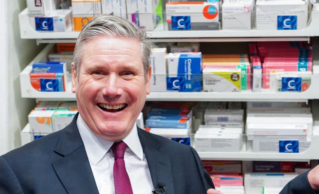 Labour Party leader Sir Keir Starmer during a visit to a Boots pharmacy (Ian West/PA)