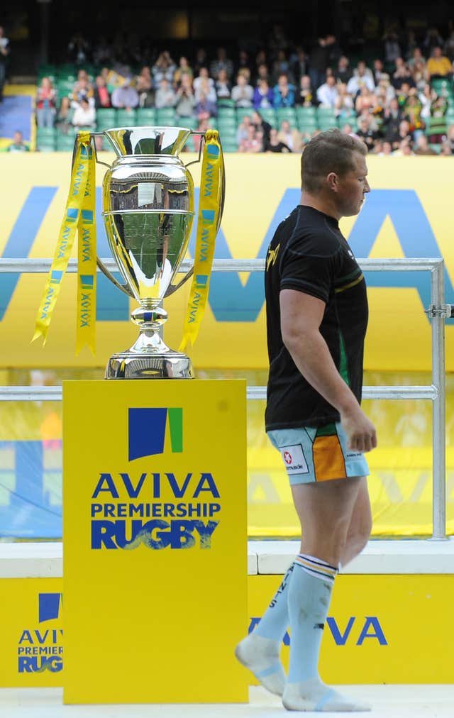 Dylan Hartley walks past the Premiership trophy after Northampton’s defeat to Leicester 