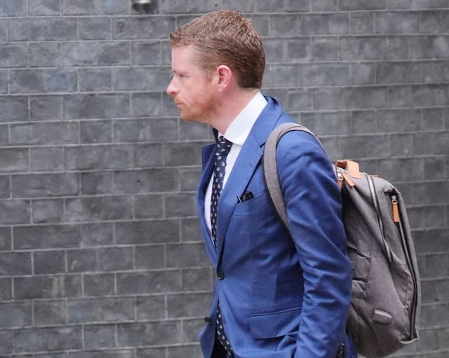 Morgan McSweeney walks along Downing Street