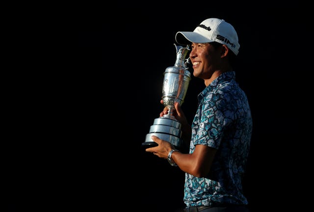 Collin Morikawa poses with the Claret Jug after winning The Open at The Royal St George's Golf Club in Sandwich. The American, claiming his first major, finished on 15 under, two shots clear of Jordan Speith.